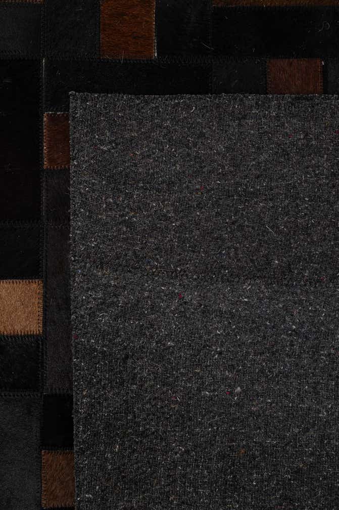 5' 3 x 8' 2 Cowhide - Patchwork Rug