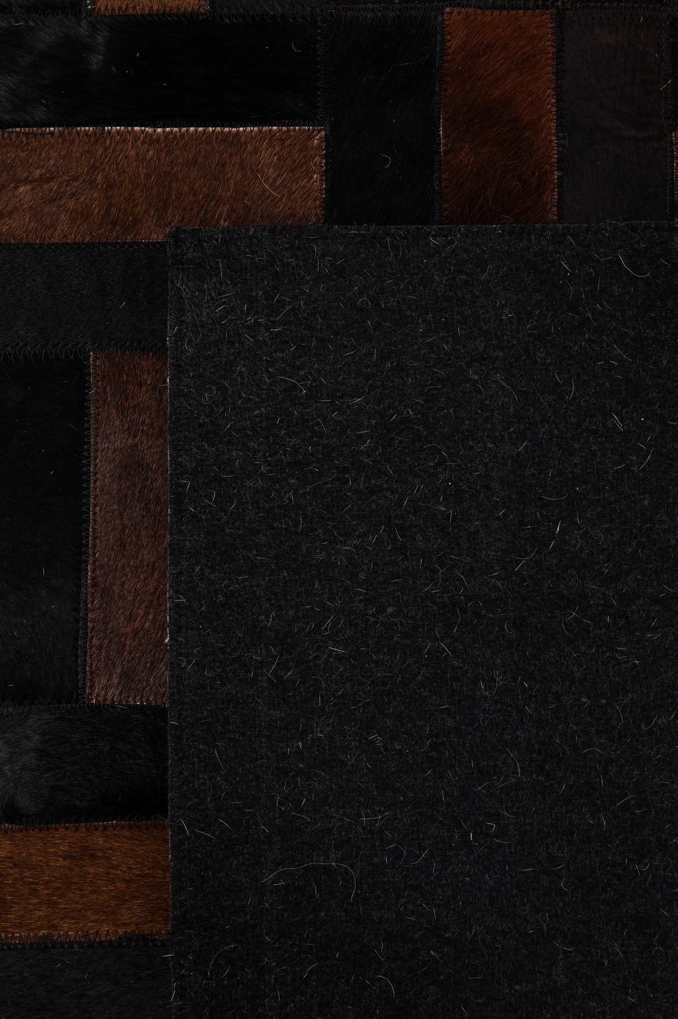 5' 3 x 8' 2 Cowhide - Patchwork Rug