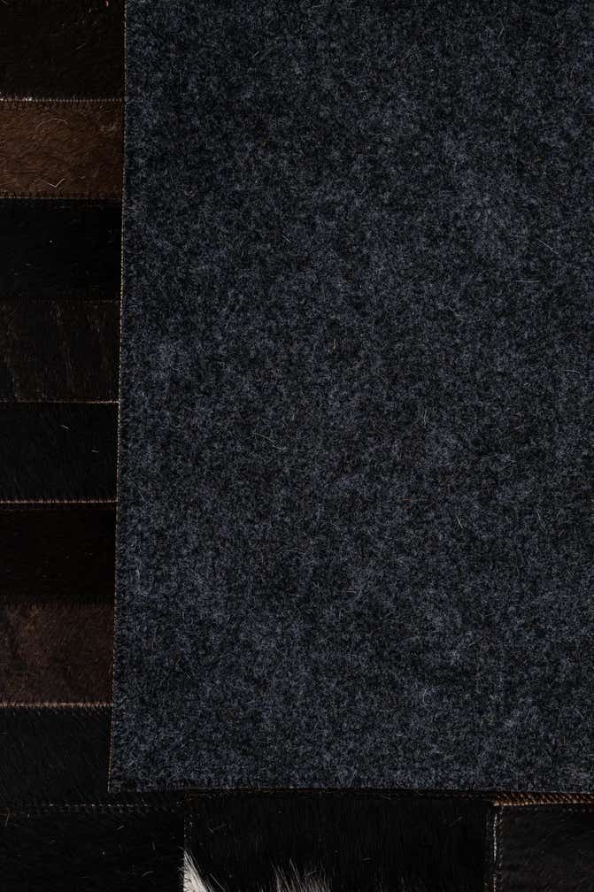 4' 11 x 8' Cowhide - Patchwork Rug