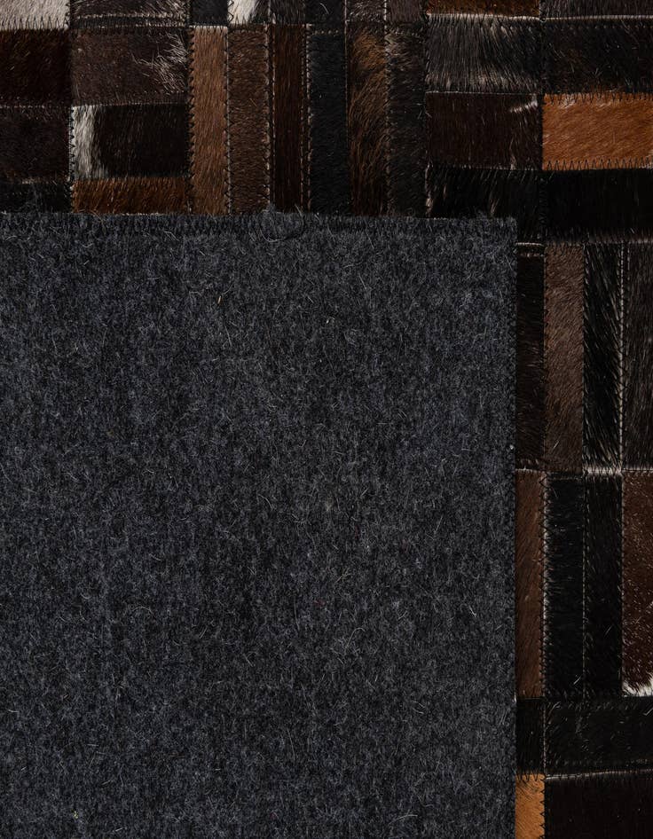 Detail image of 5' 1 x 8' Cowhide - Patchwork Rug