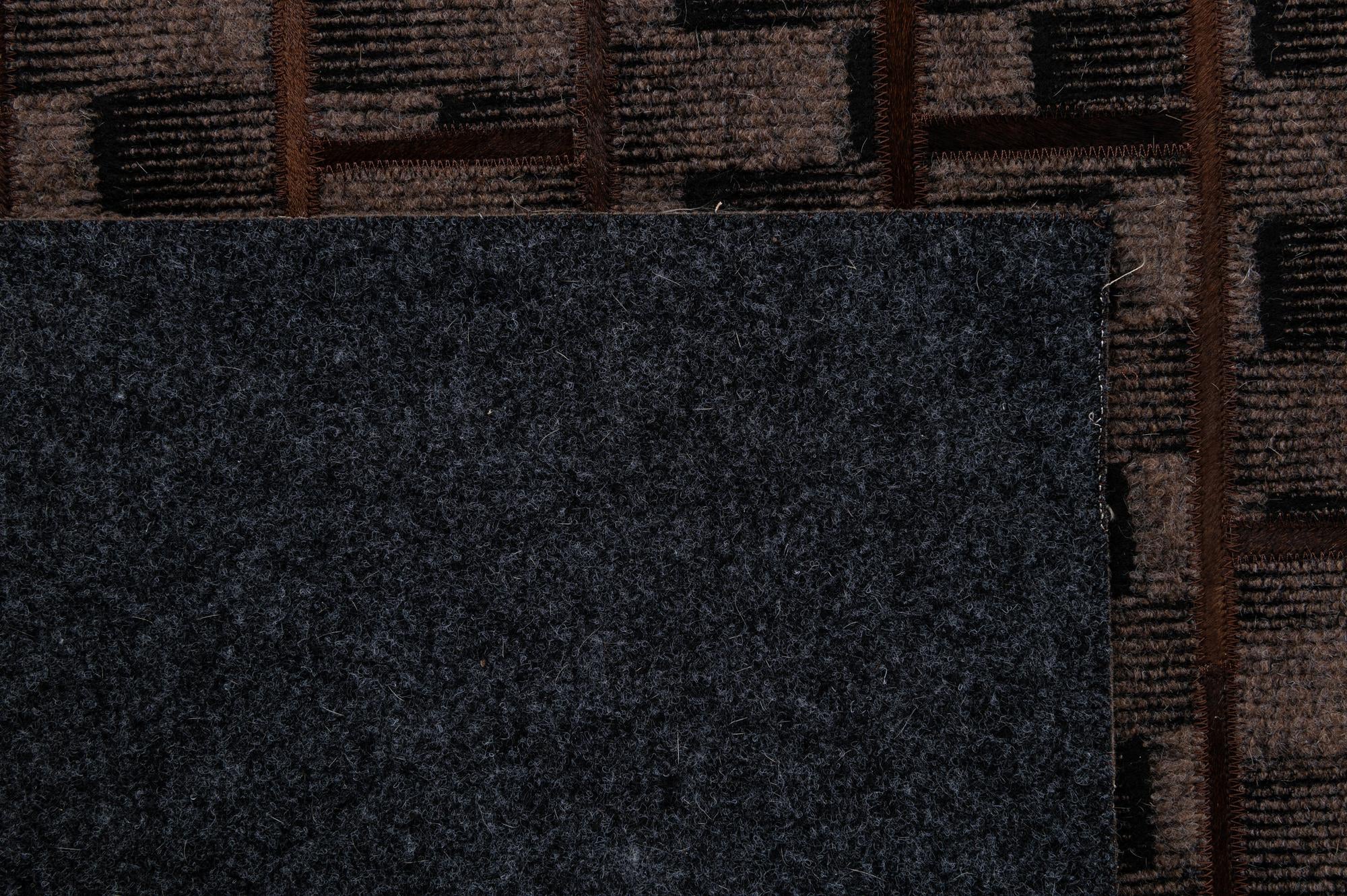 5' 1 x 7' 8 Cowhide - Patchwork Rug