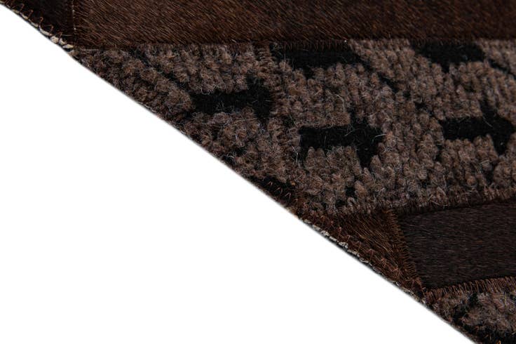 Detail image of 4' 11 x 7' 11 Cowhide - Patchwork Rug