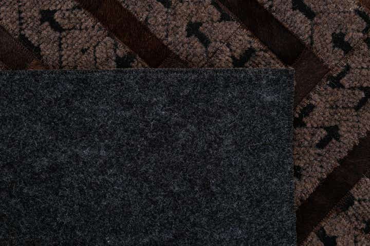 4' 11 x 7' 11 Cowhide - Patchwork Rug