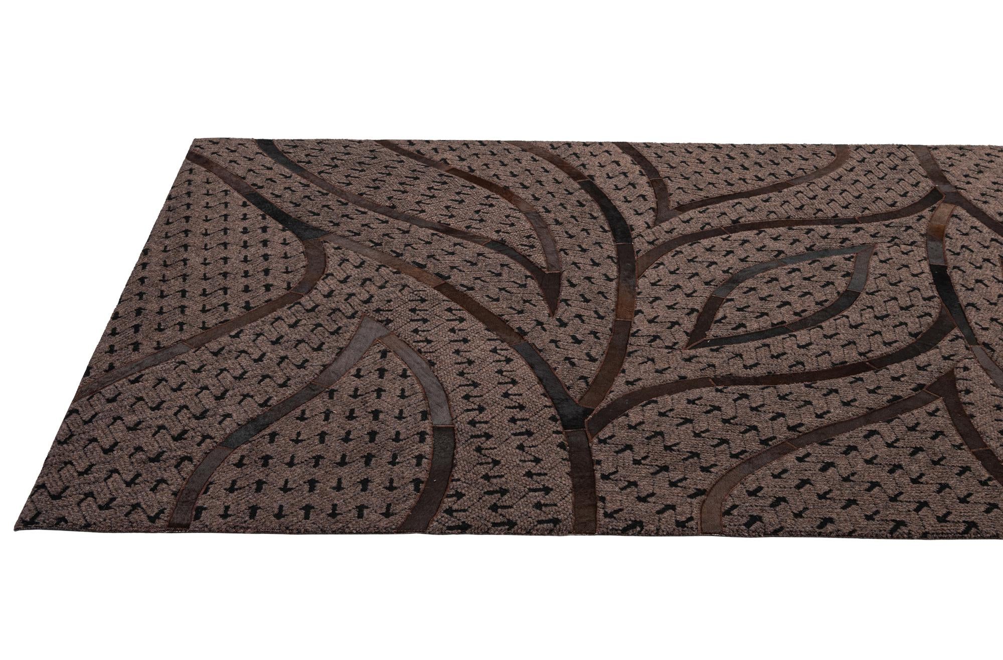 4' 11 x 8' 1 Cowhide - Patchwork Rug