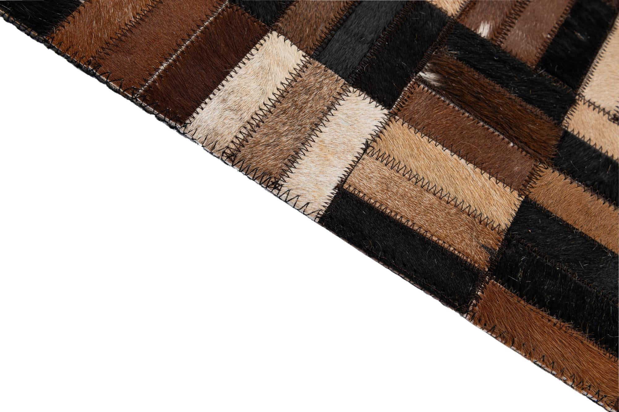 4' 11 x 7' 11 Cowhide - Patchwork Rug