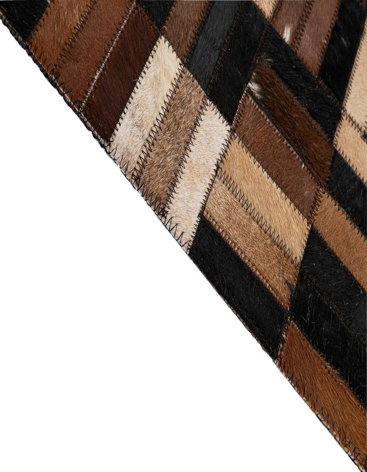 Detail image of 4' 11 x 7' 11 Cowhide - Patchwork Rug