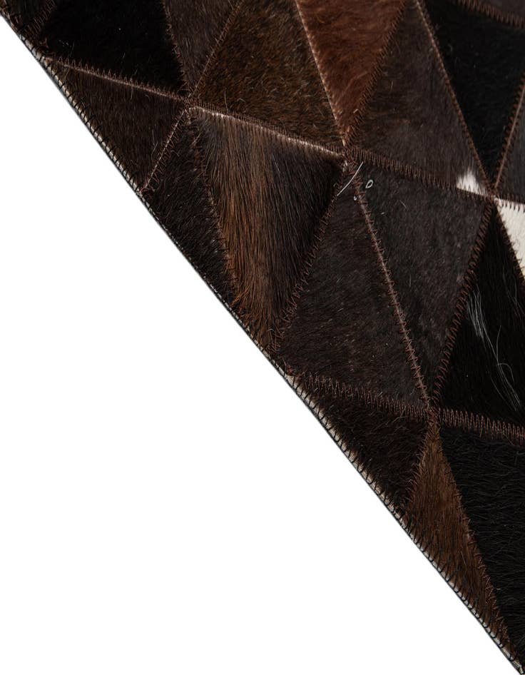 Detail image of 5' 1 x 7' 11 Cowhide - Patchwork Rug
