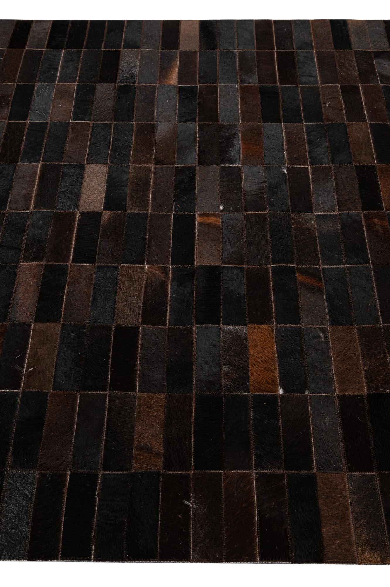 4' 11 x 8' 1 Cowhide - Patchwork Rug
