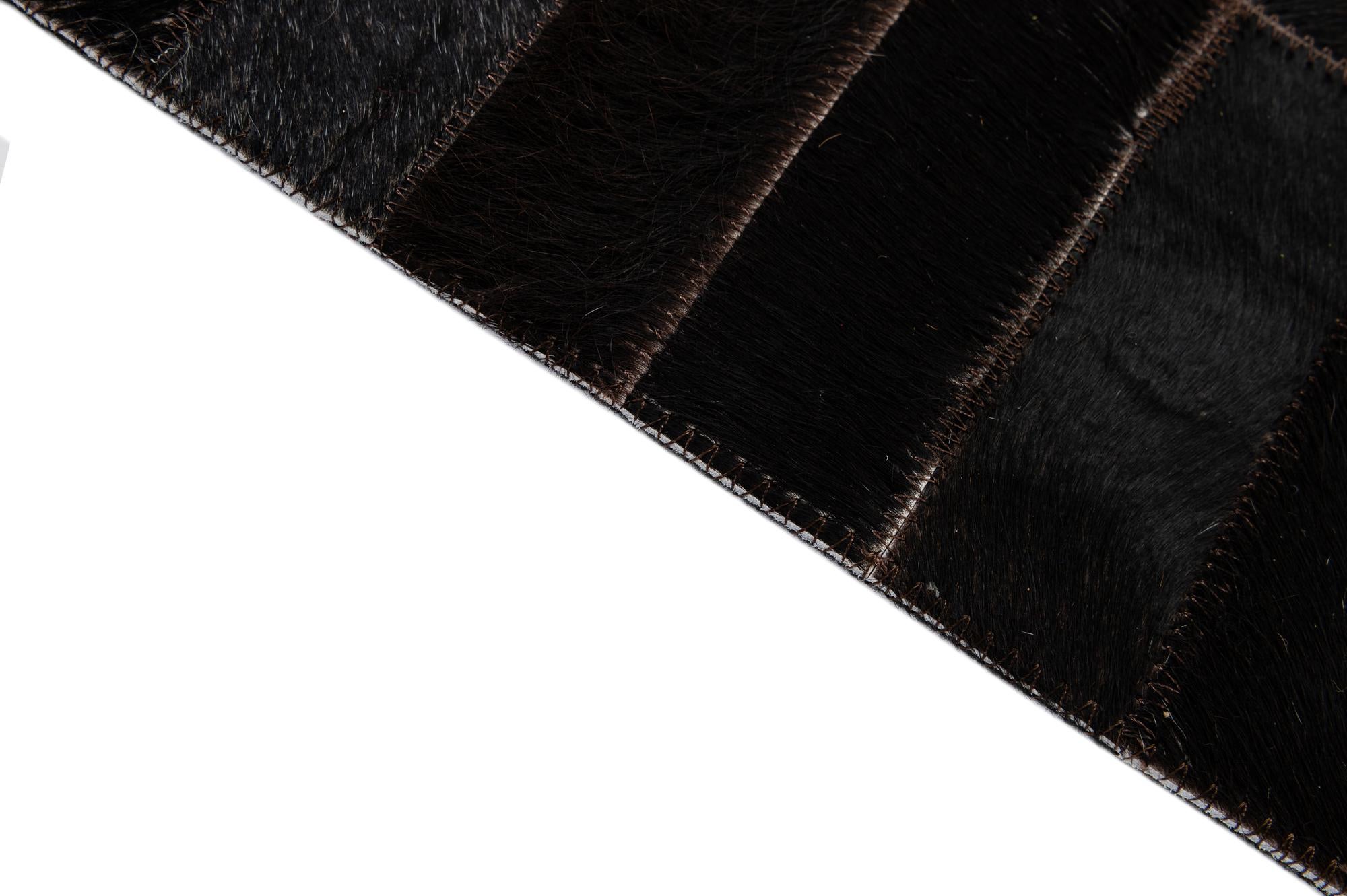 4' 11 x 8' 1 Cowhide - Patchwork Rug