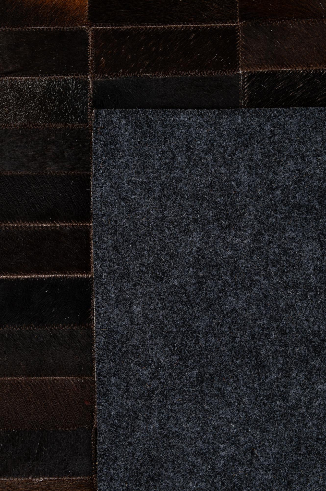 4' 11 x 8' 1 Cowhide - Patchwork Rug