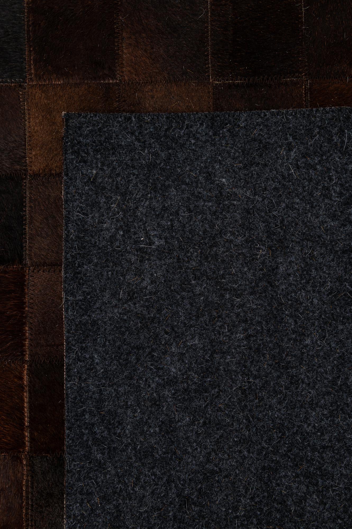 5' 2 x 8' 1 Cowhide - Patchwork Rug