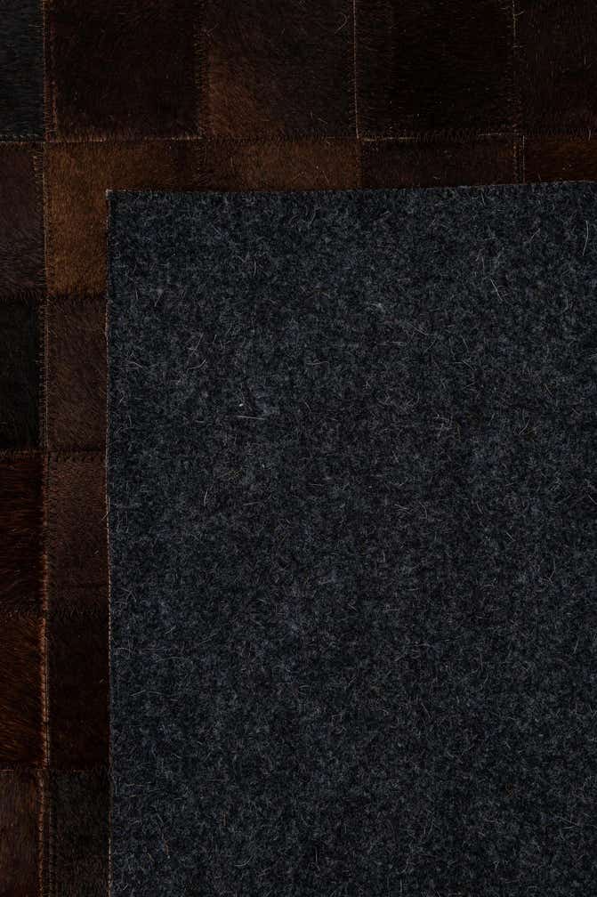 5' 2 x 8' 1 Cowhide - Patchwork Rug