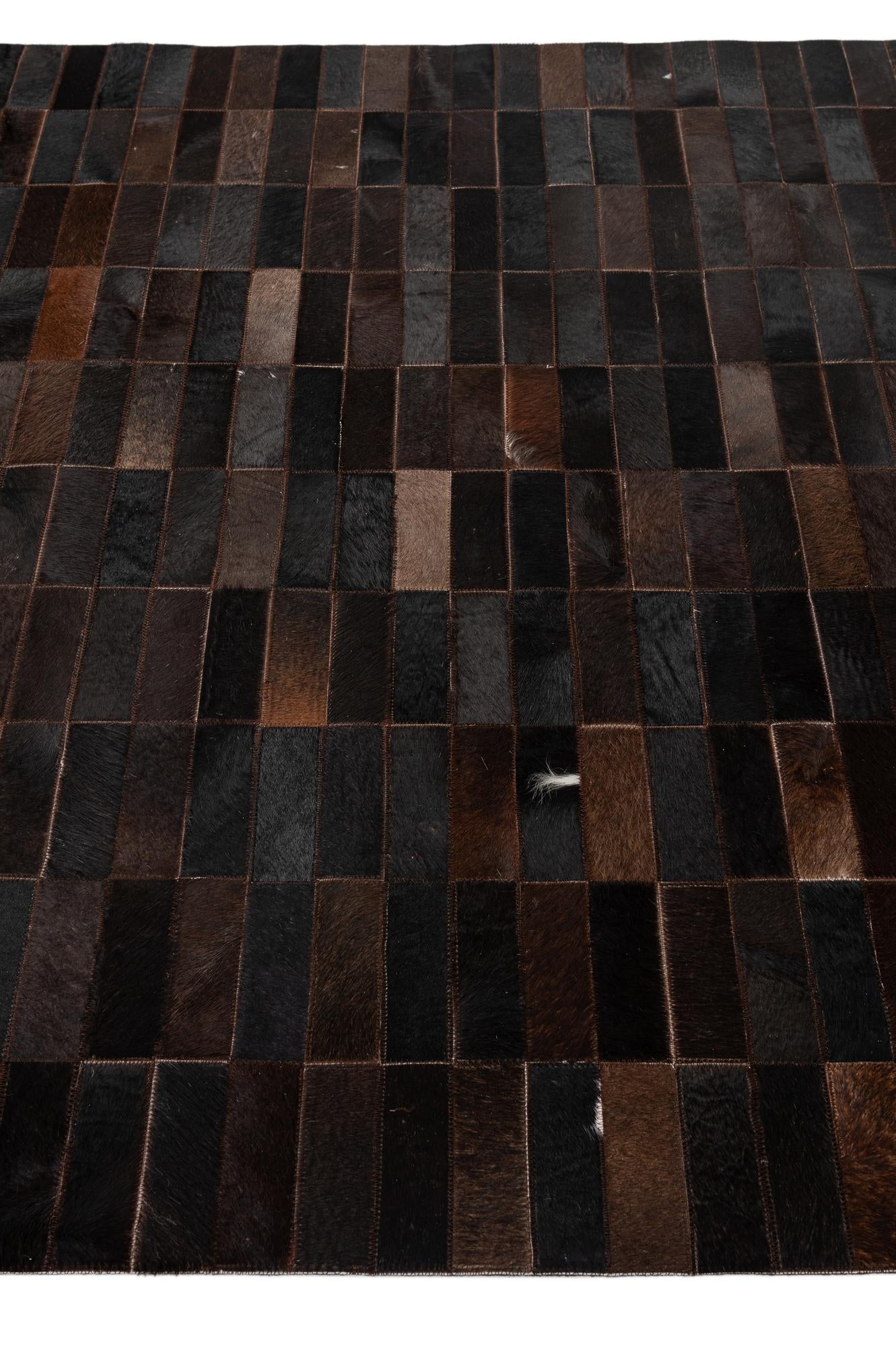 4' 11 x 8' 1 Cowhide - Patchwork Rug
