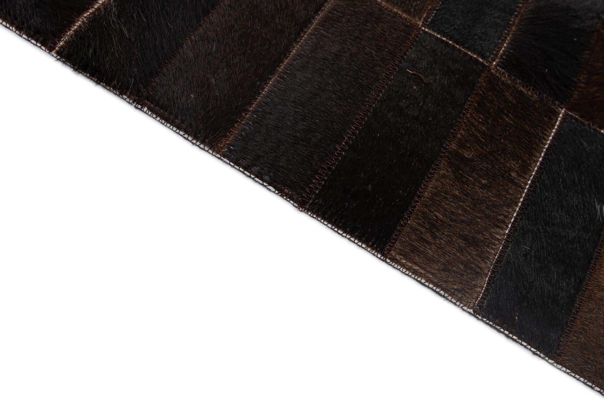 4' 11 x 8' 1 Cowhide - Patchwork Rug