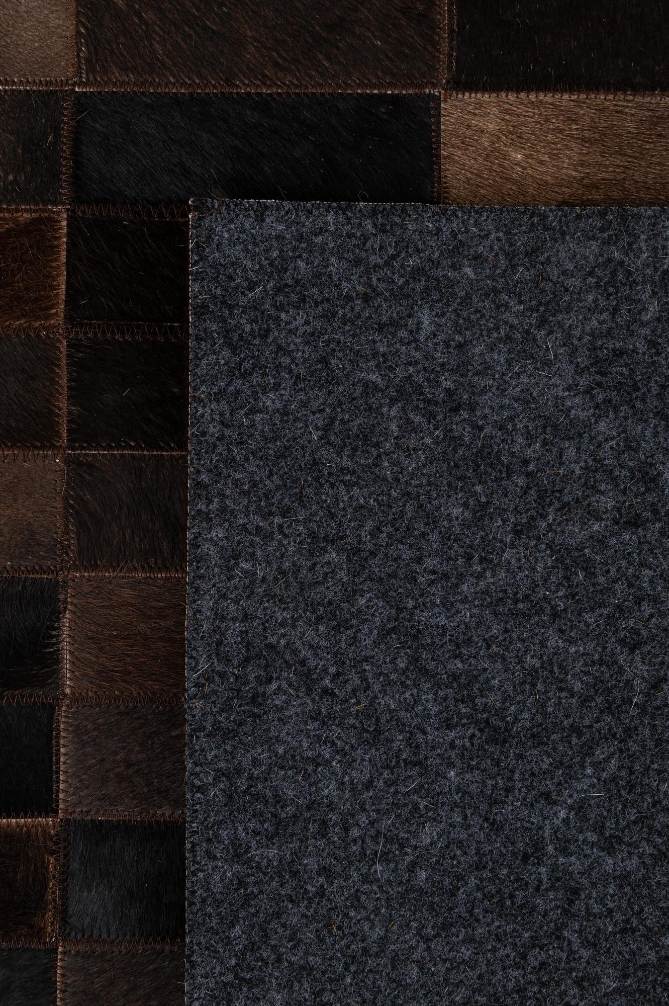 4' 11 x 8' 1 Cowhide - Patchwork Rug
