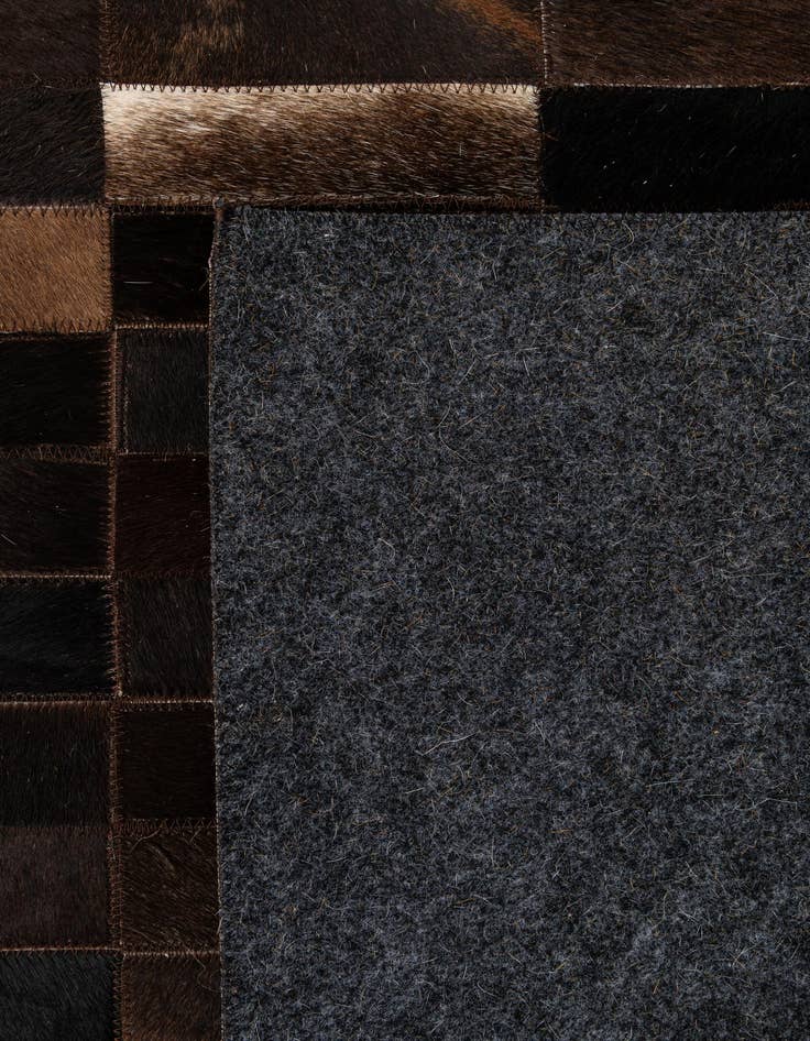 Detail image of 5' 1 x 8' Cowhide - Patchwork Rug