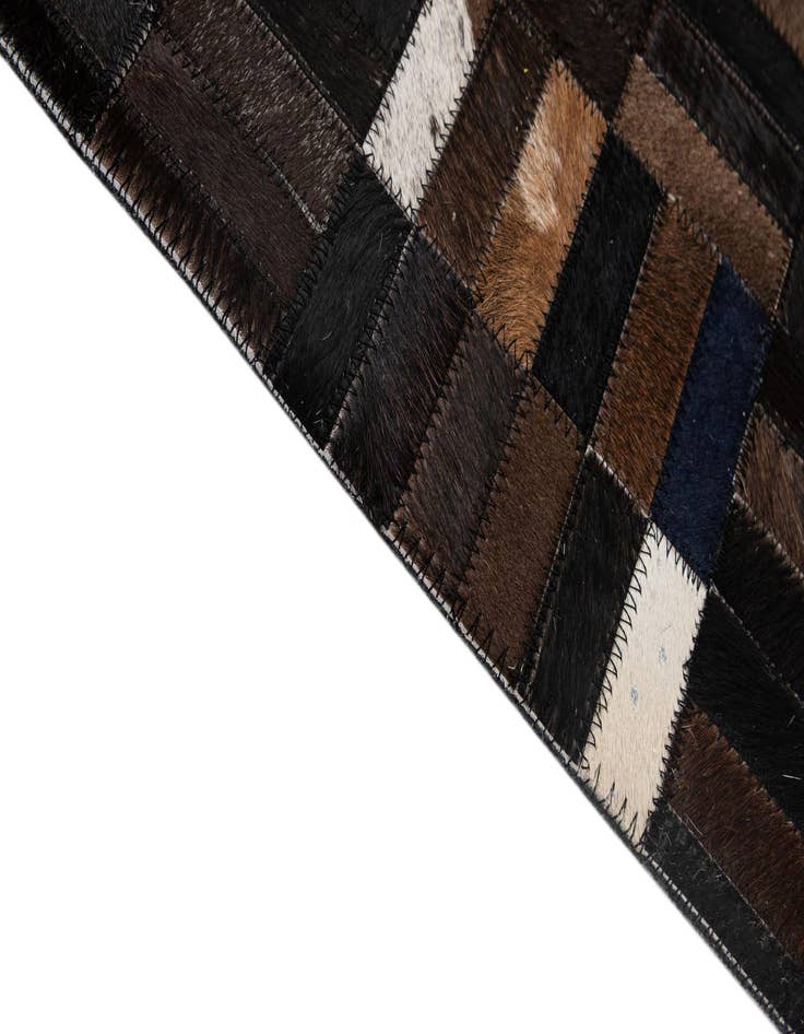 Detail image of 5' 1 x 8' Cowhide - Patchwork Rug