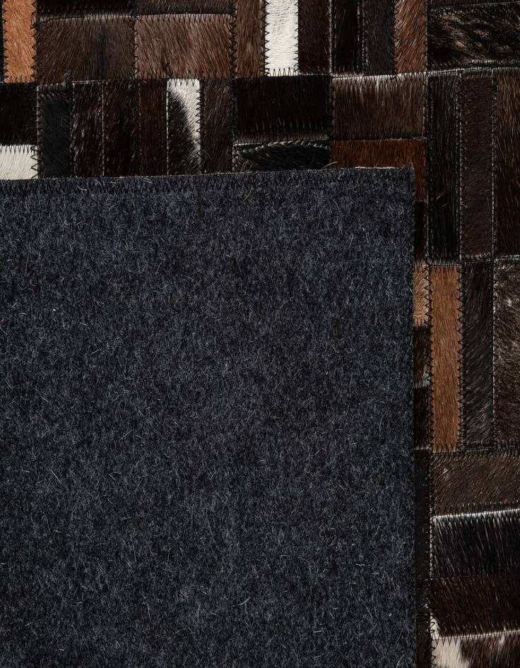 Detail image of 5' 2 x 8' Cowhide - Patchwork Rug