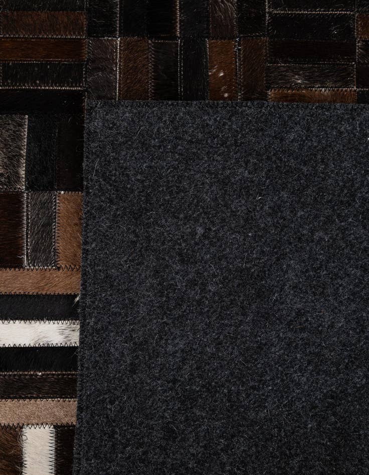 Detail image of 5' x 7' 11 Cowhide - Patchwork Rug