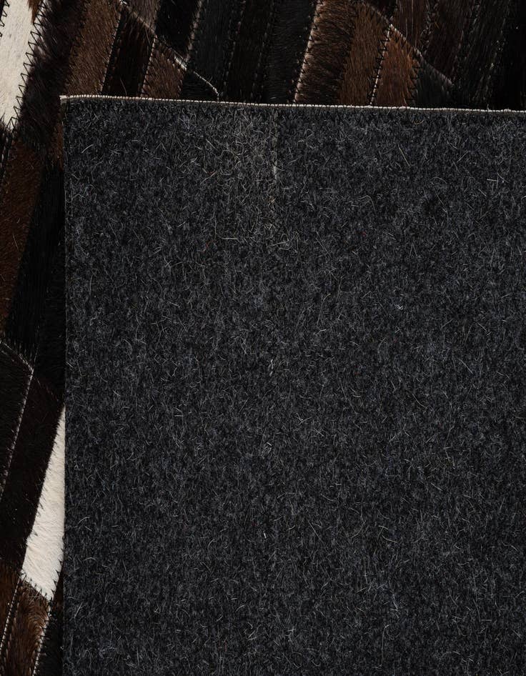 Detail image of 5' 2 x 8' Cowhide - Patchwork Rug