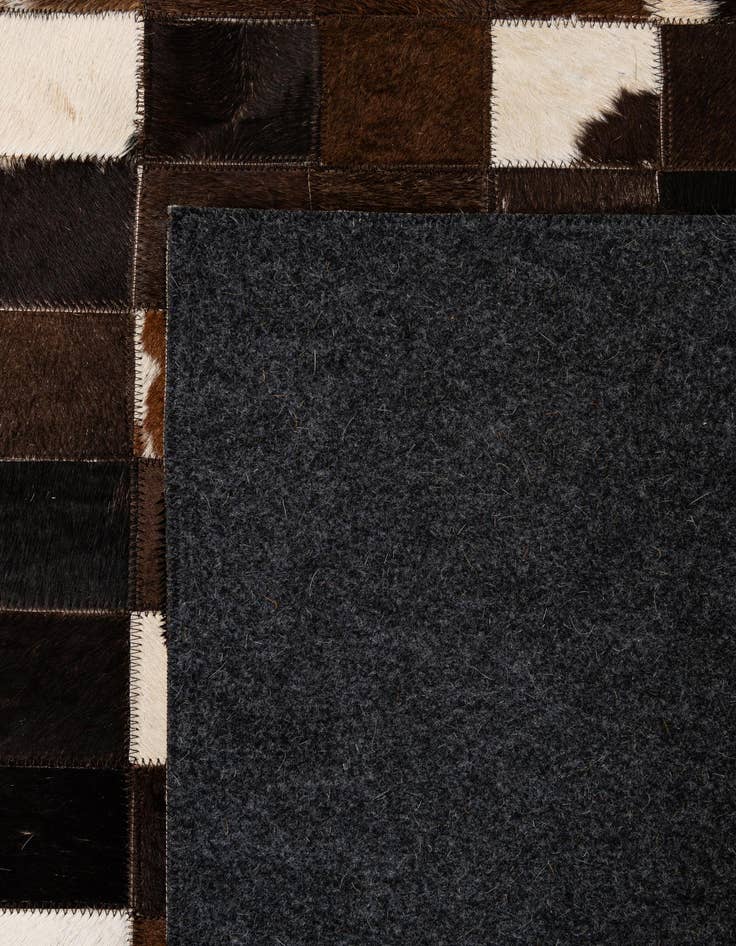 Detail image of 5' 1 x 7' 11 Cowhide - Patchwork Rug