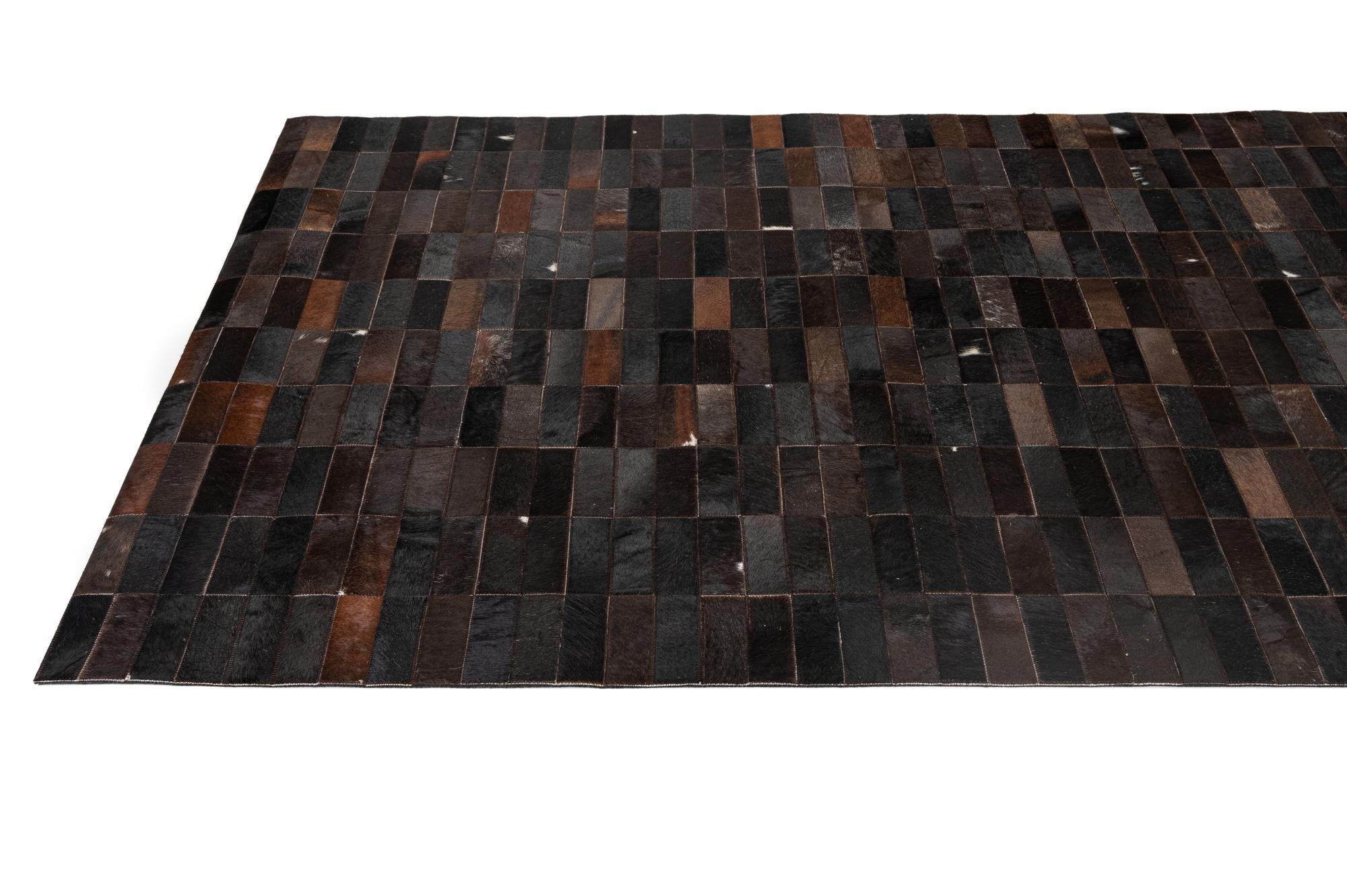 4' 11 x 8' 1 Cowhide - Patchwork Rug