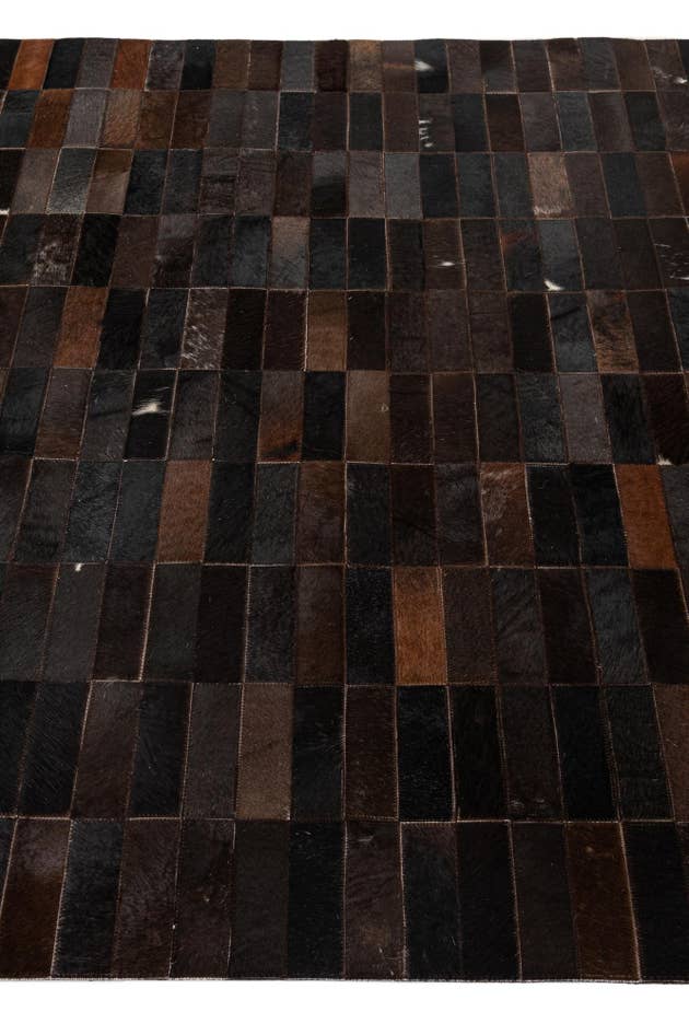 Detail image of 4' 11 x 8' 1 Cowhide - Patchwork Rug