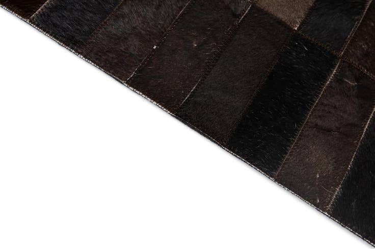 Detail image of 4' 11 x 8' 1 Cowhide - Patchwork Rug