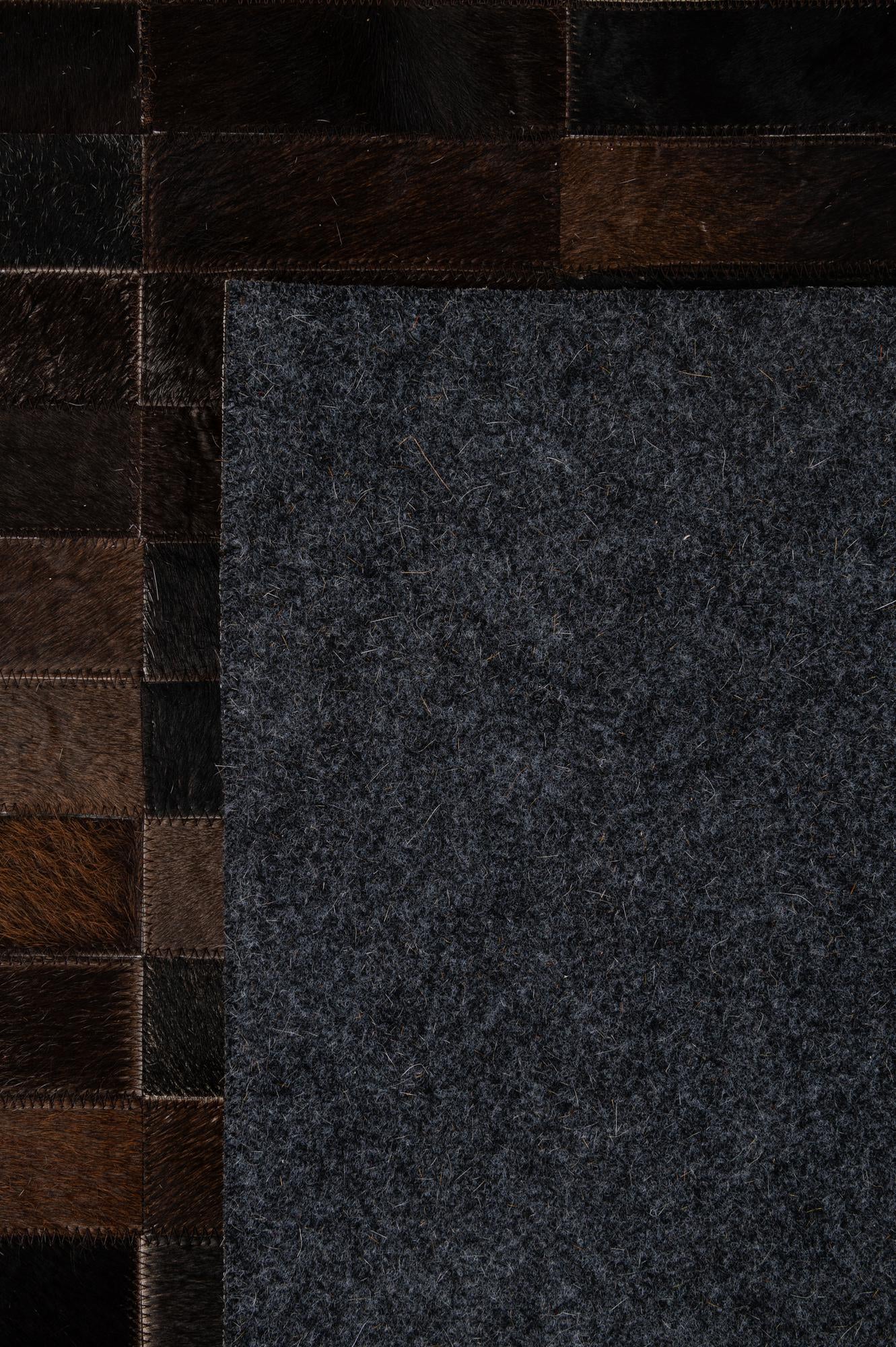 4' 11 x 8' 1 Cowhide - Patchwork Rug