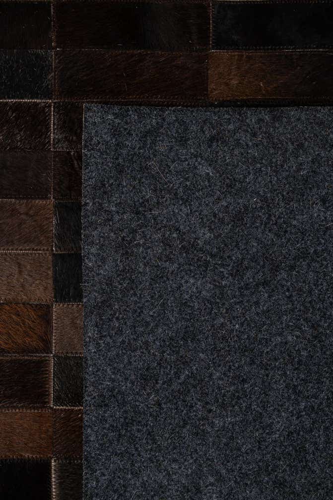 4' 11 x 8' 1 Cowhide - Patchwork Rug