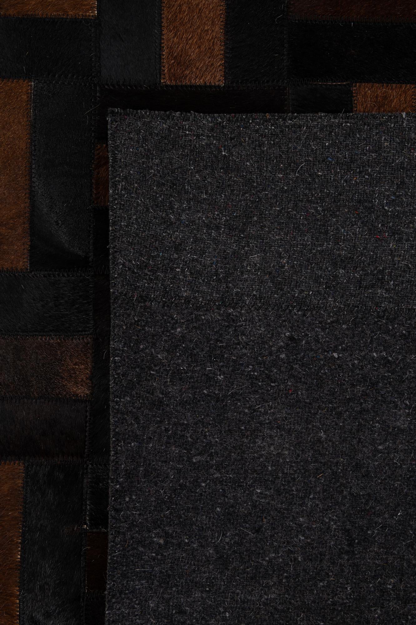 5' 3 x 8' 1 Cowhide - Patchwork Rug