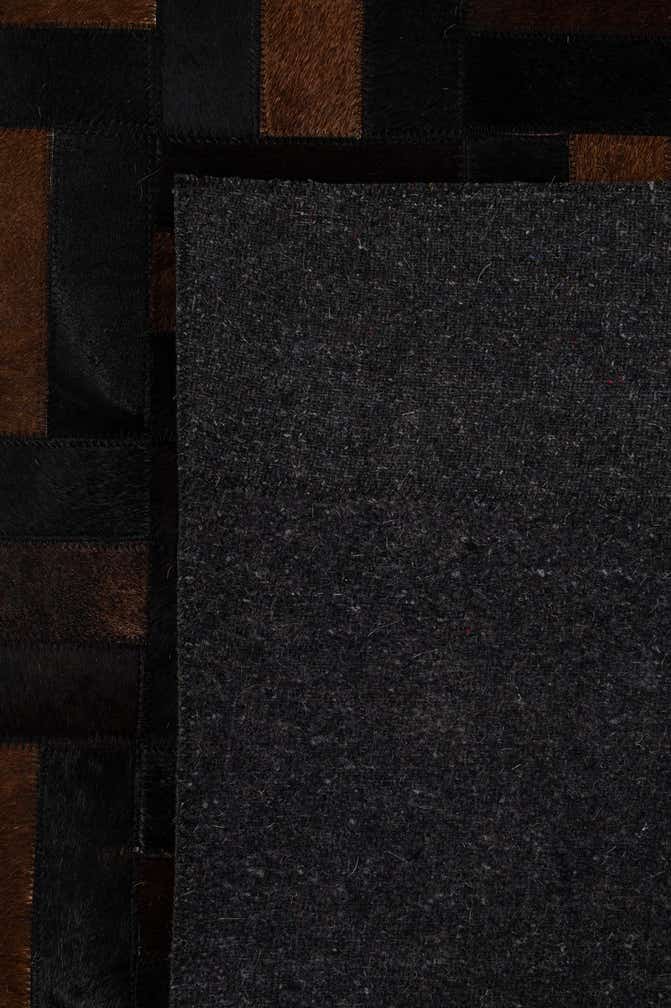 5' 3 x 8' 1 Cowhide - Patchwork Rug