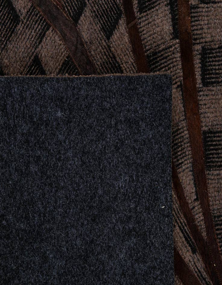 Detail image of 5' 1 x 8' 1 Cowhide - Patchwork Rug