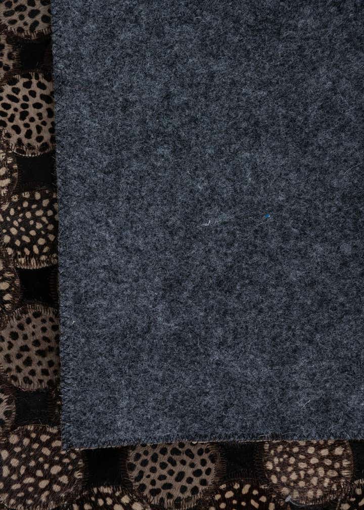 5' 1 x 7' 10 Cowhide Leather Rug