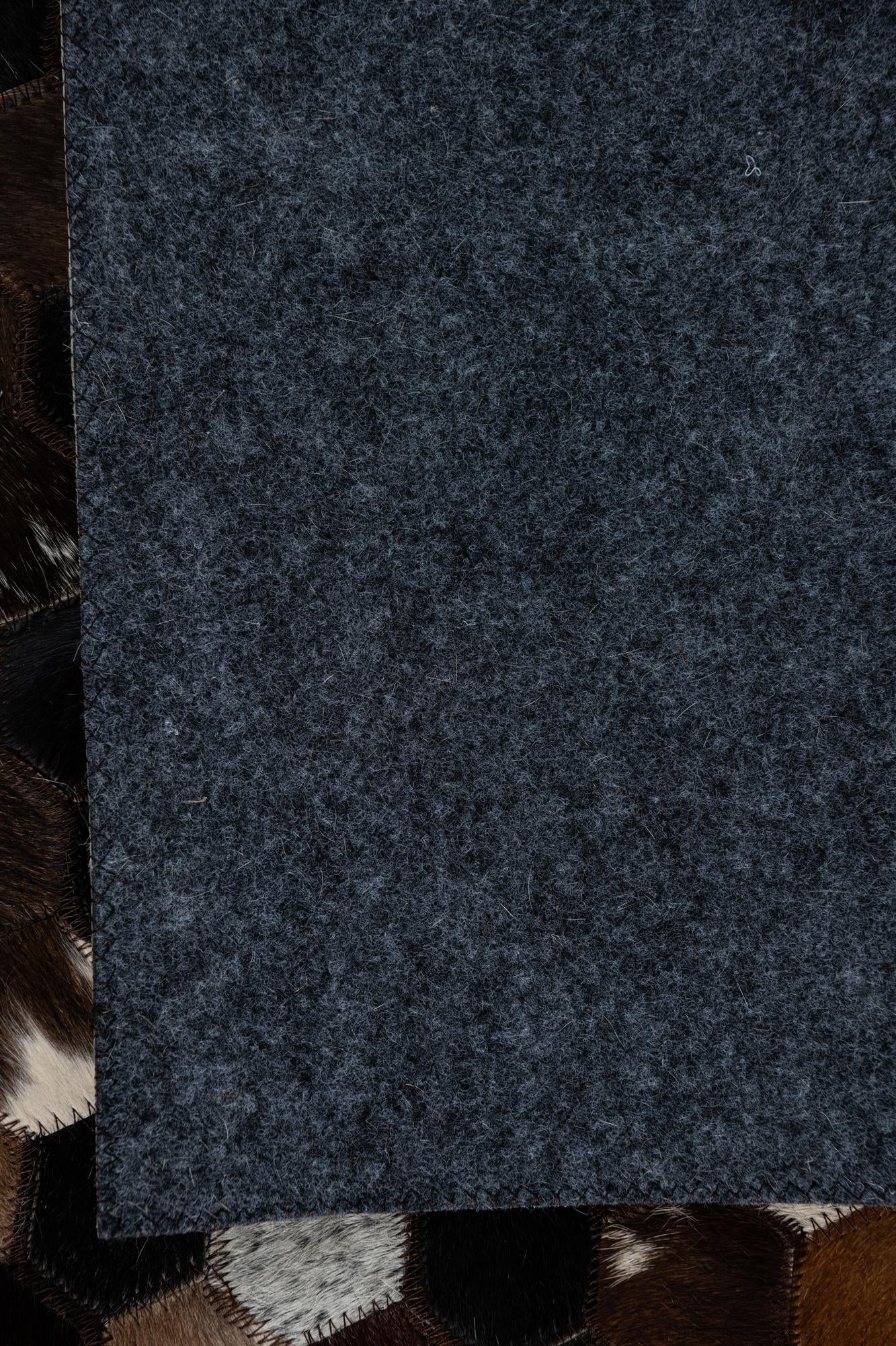 5' x 7' 9 Cowhide Leather Rug