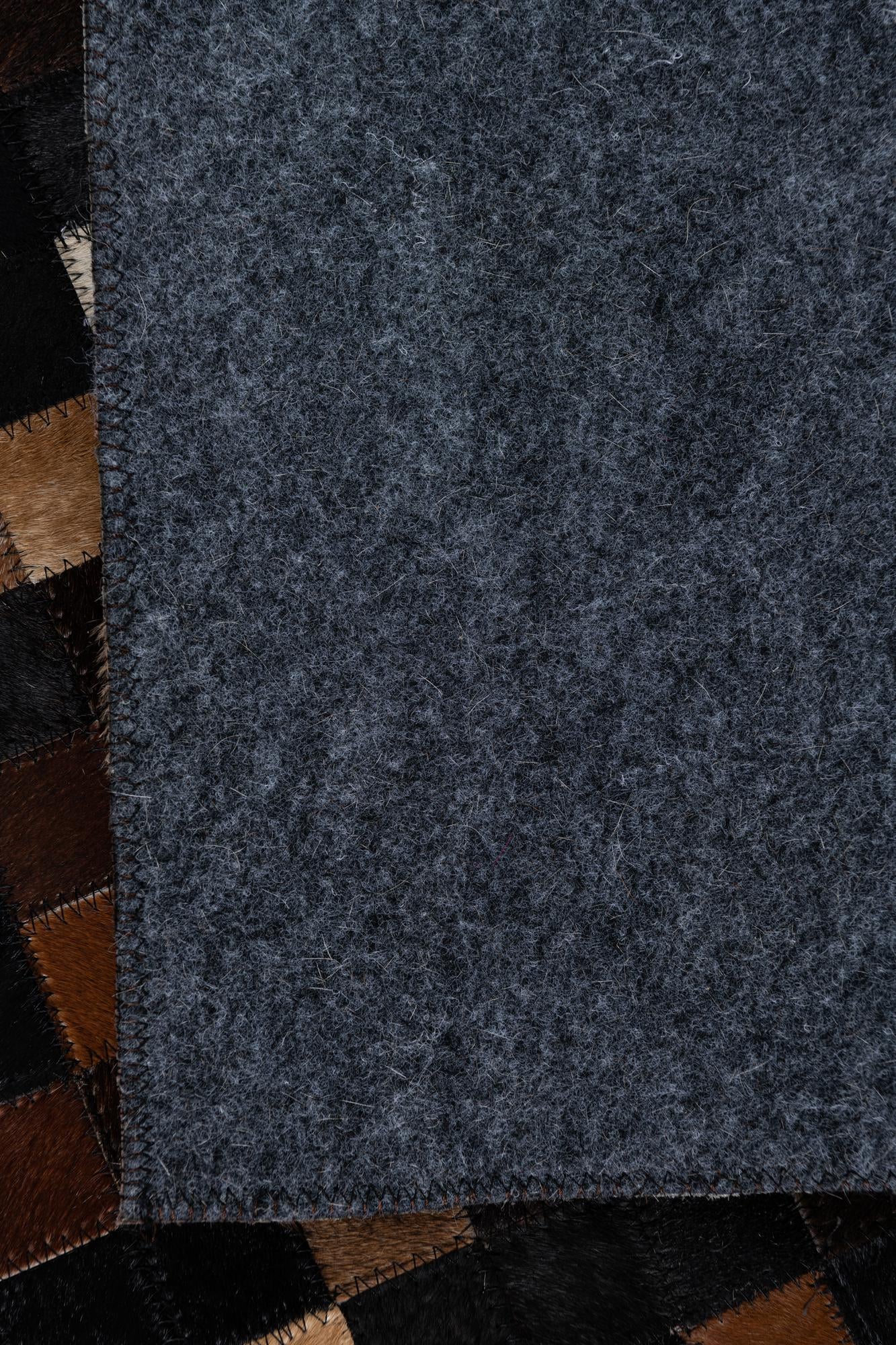 5' 1 x 7' 10 Cowhide Leather Rug