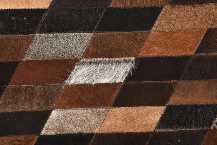 5' 1 x 7' 6 Cowhide Rug
