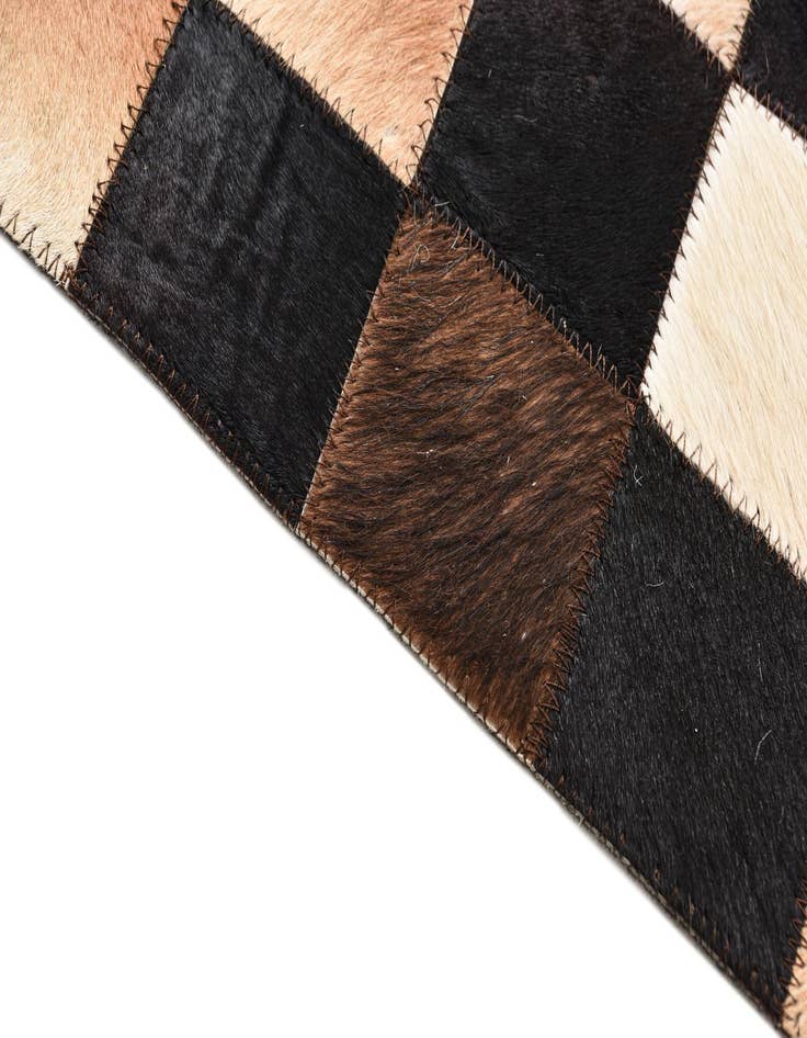 Detail image of 5' x 7' 10 Cowhide Rug