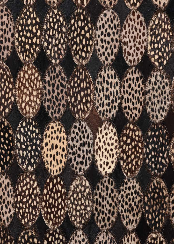 5' 1 x 7' 1 Cowhide Rug
