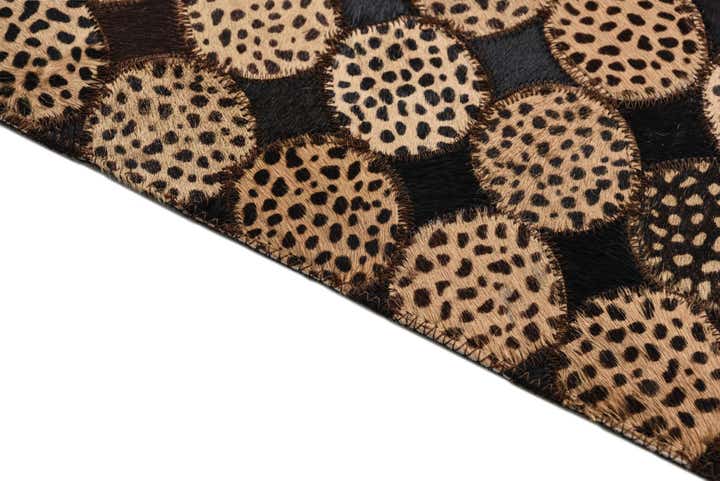 5' 2 x 7' 8 Cowhide Rug