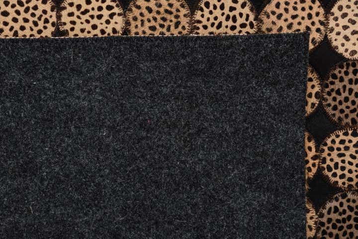 5' 2 x 7' 8 Cowhide Rug