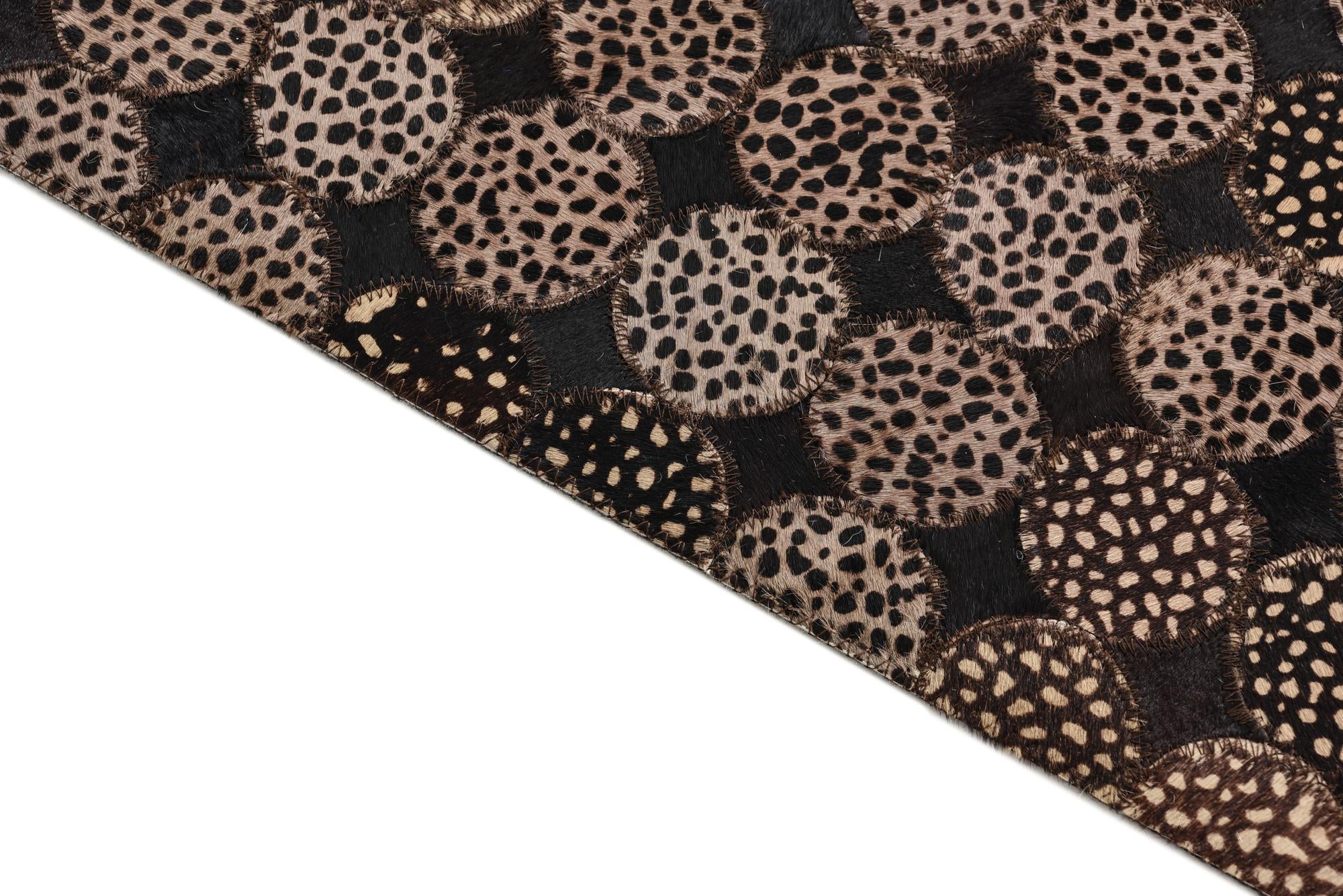 5' 1 x 7' 2 Cowhide Rug