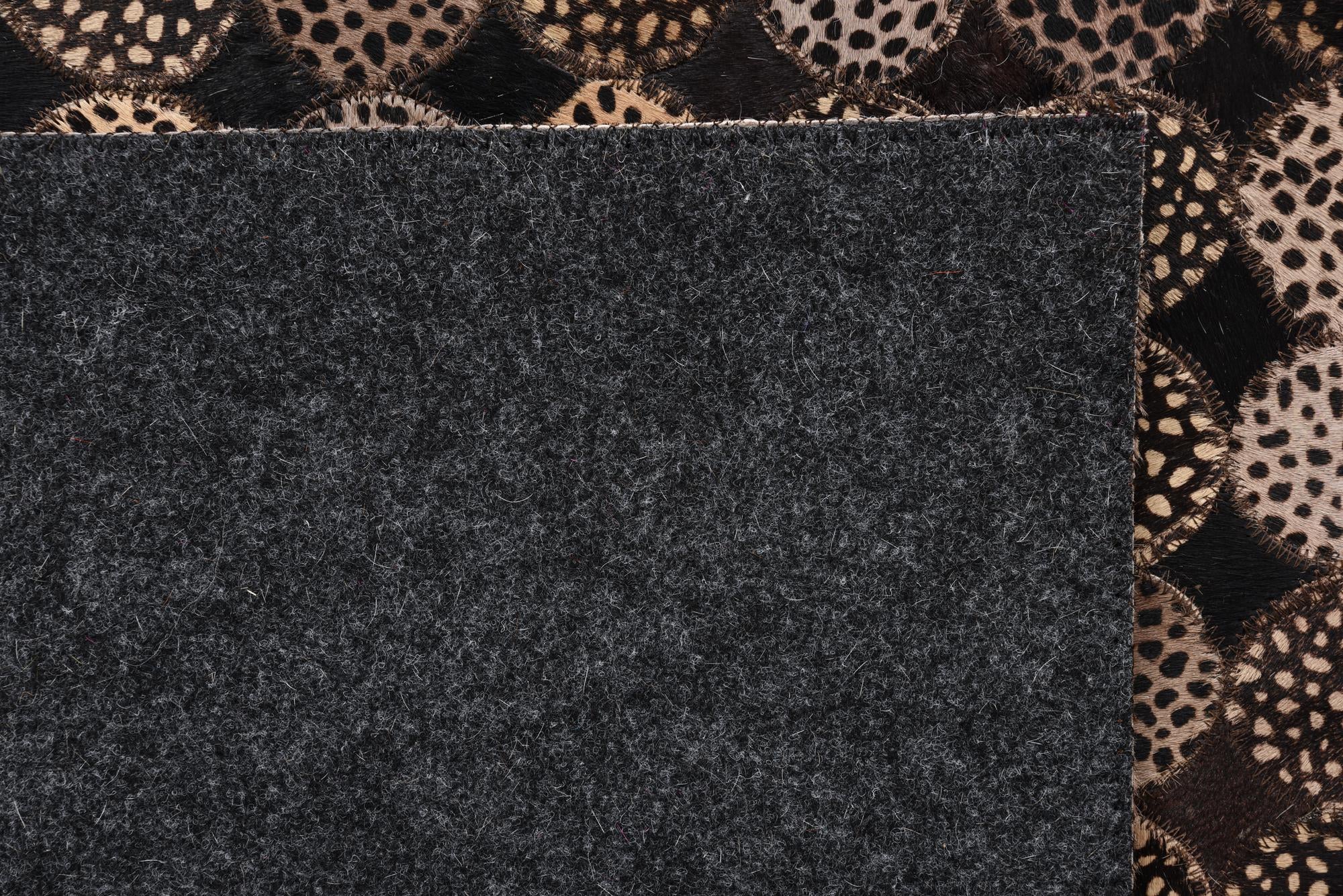 5' 1 x 7' 2 Cowhide Rug