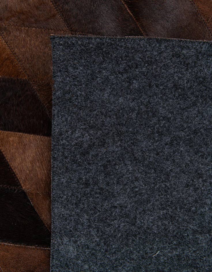 Detail image of 8' 1 x 10' 2 Cowhide Stocks Rug
