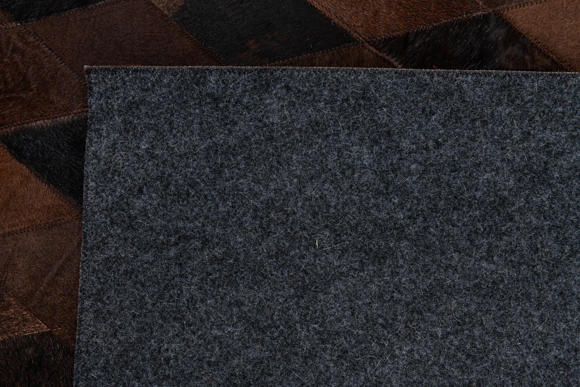 8' 1 x 10' 1 Cowhide Stocks Rug