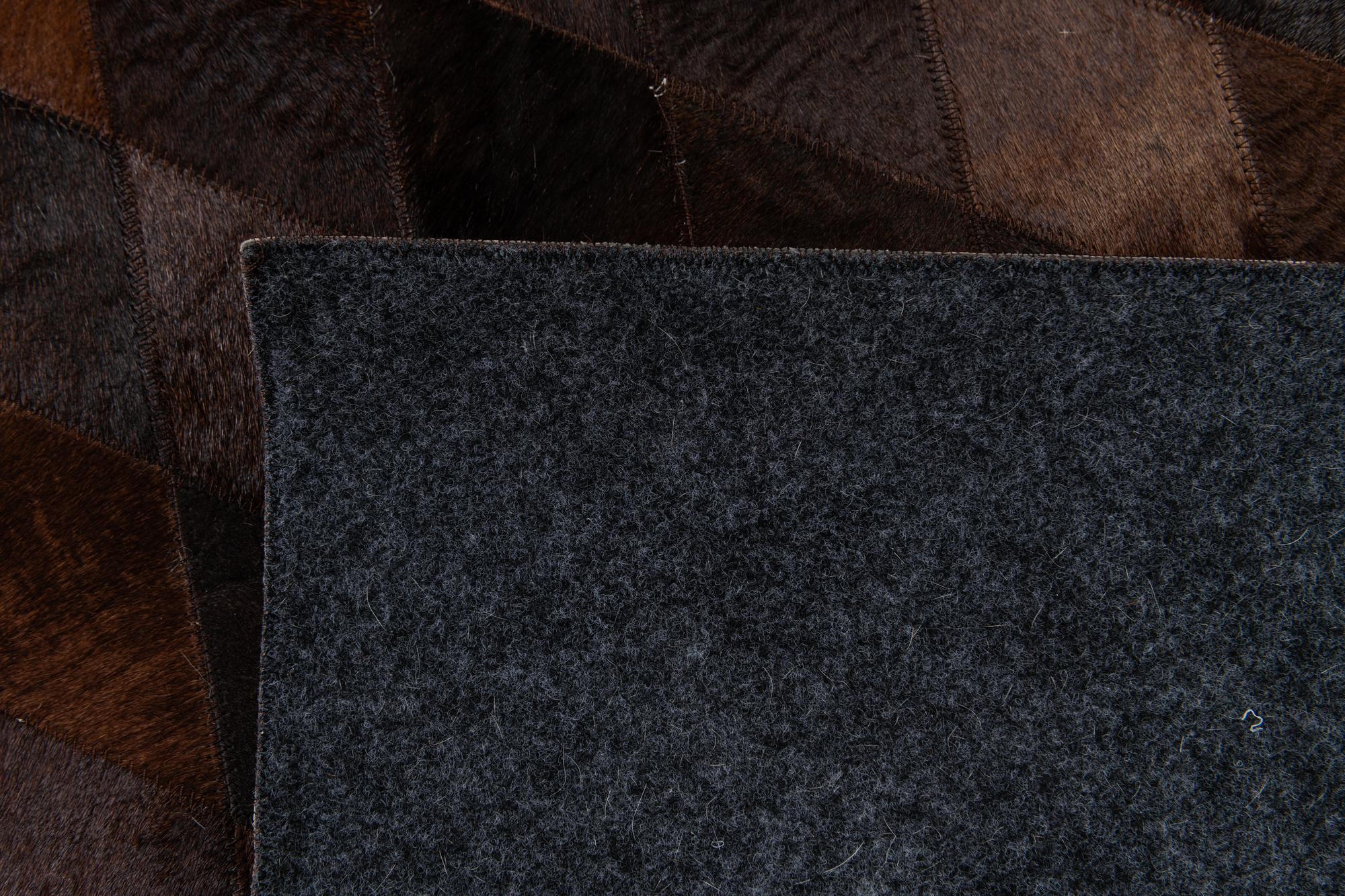 8' 1 x 10' 1 Cowhide Stocks Rug