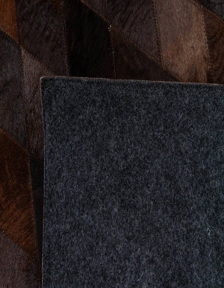 Detail image of 8' 1 x 10' 1 Cowhide Stocks Rug