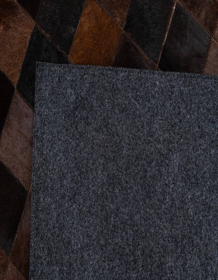 Detail image of 8' 1 x 10' 1 Cowhide Stocks Rug