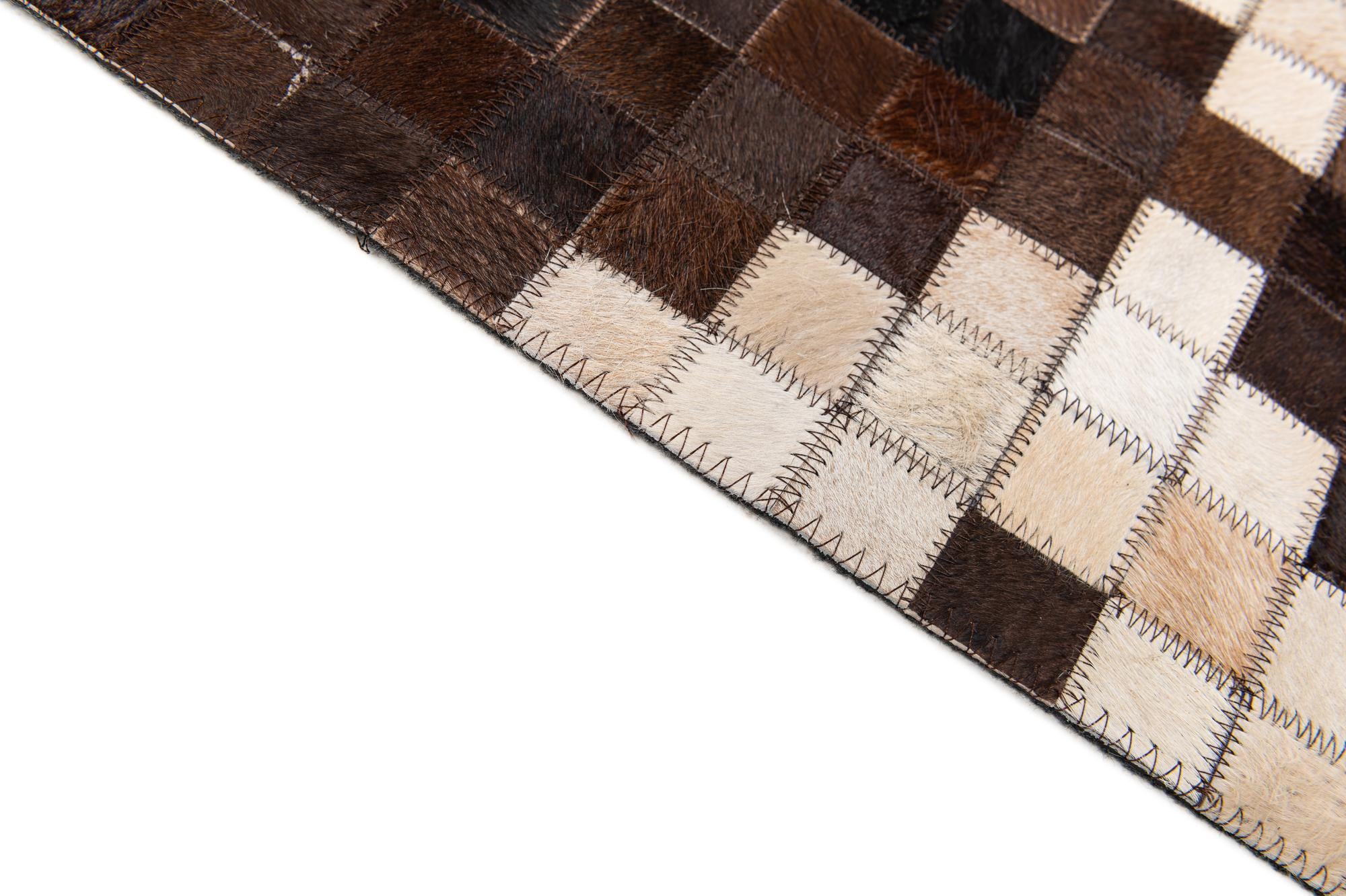 8' 1 x 9' 11 Cowhide Stocks Rug