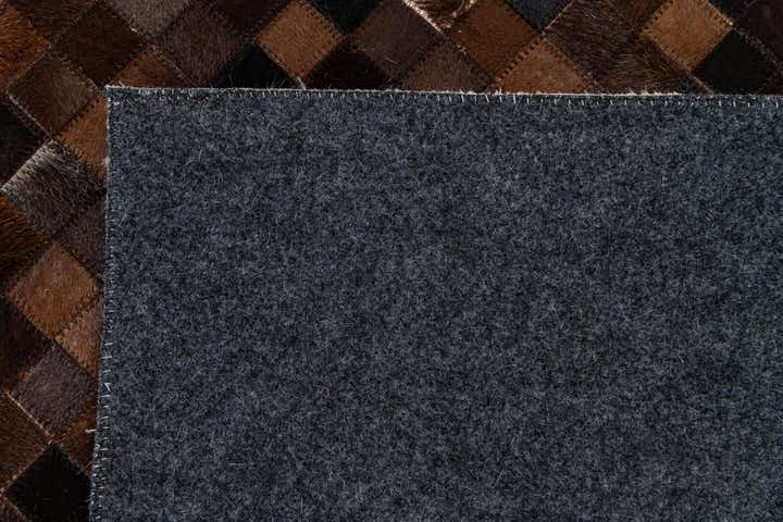 8' 1 x 9' 10 Cowhide Stocks Rug